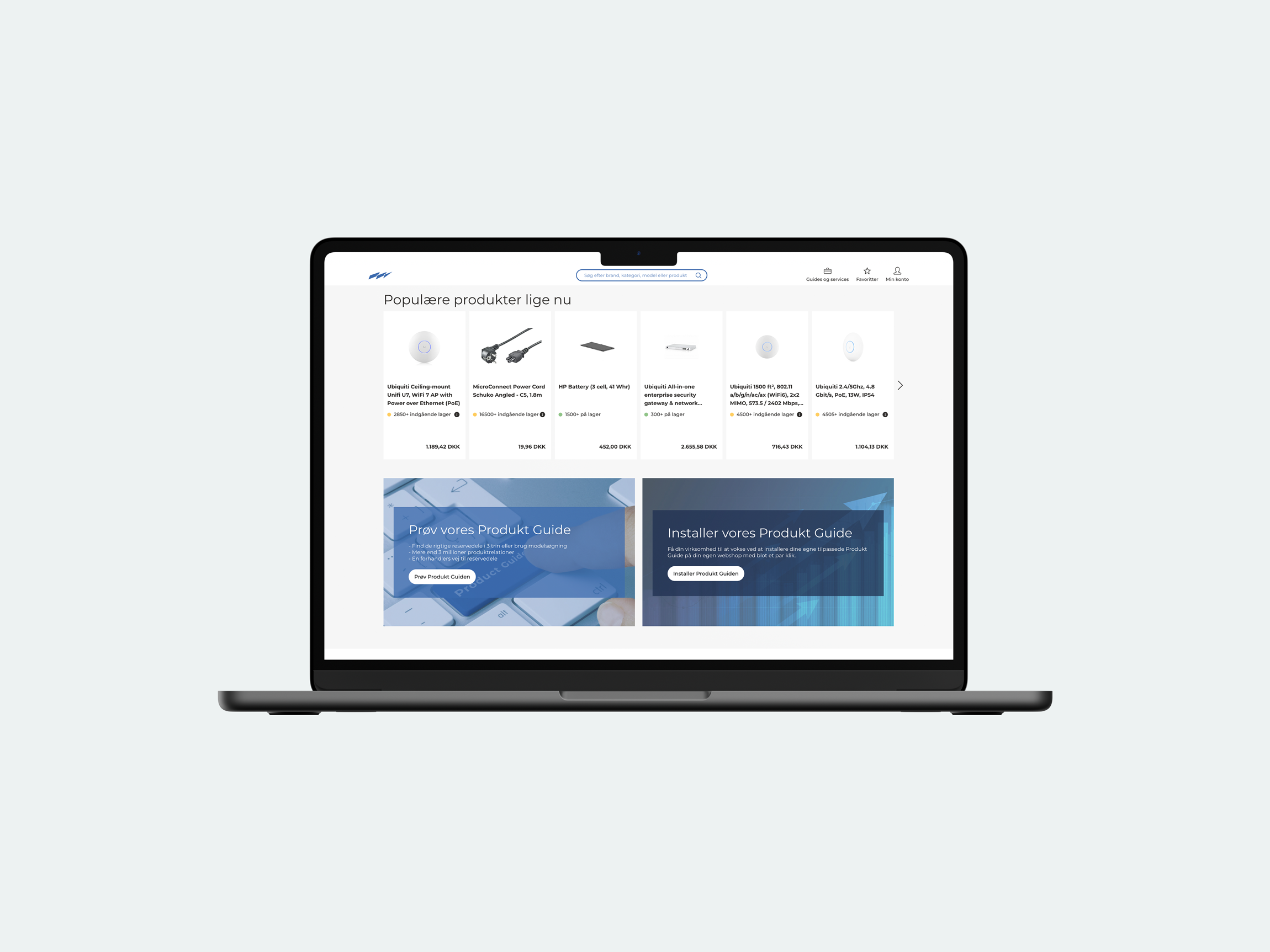 Skærmbillede af en computer med en online butik, der viser populære produkter og en produktguide i dansk sprog.