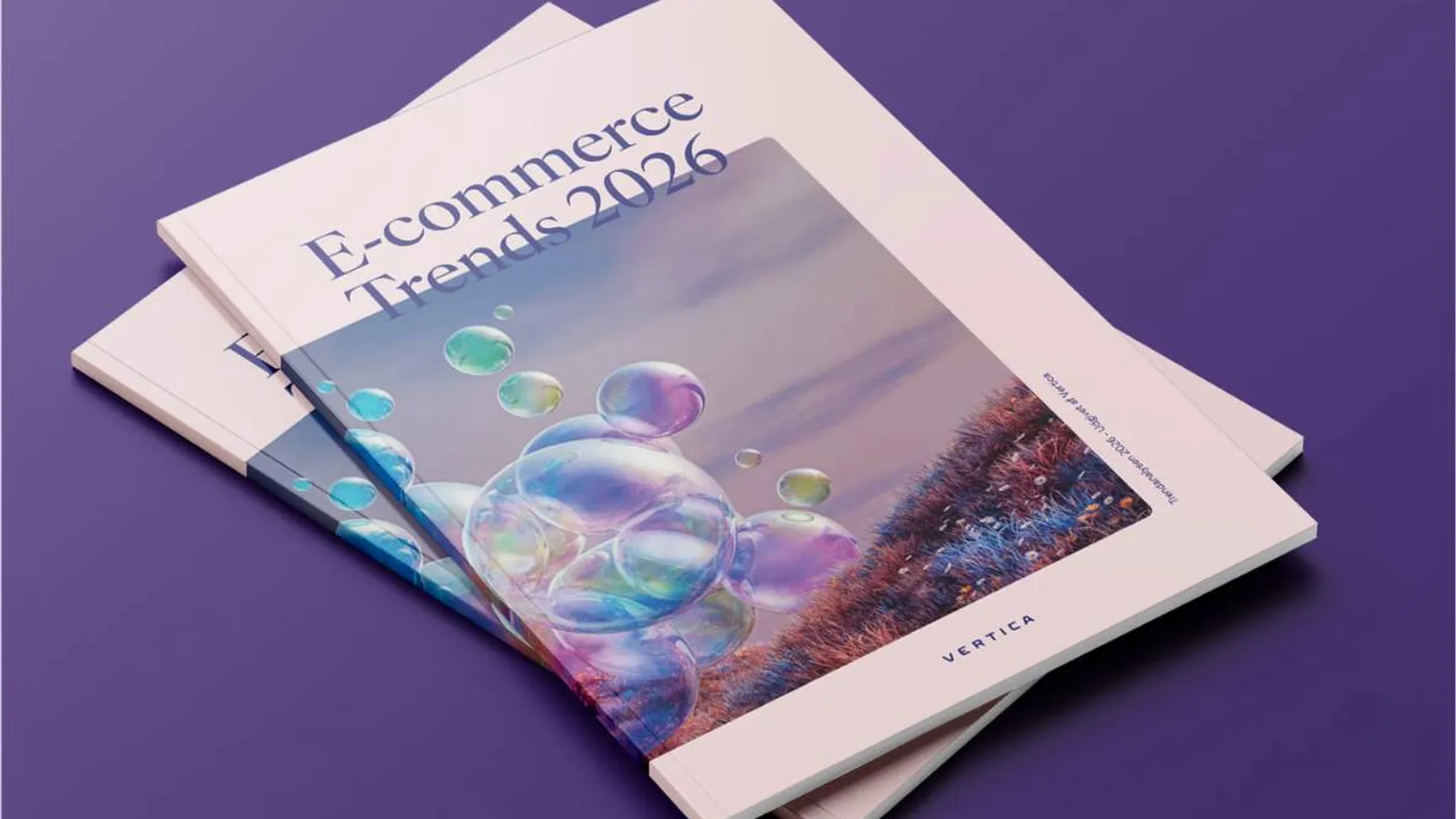 Tre brochurer med titlen "E-commerce Trends 2026" ligger på en lys overflade, prydet med farverige grafik og moderne design.