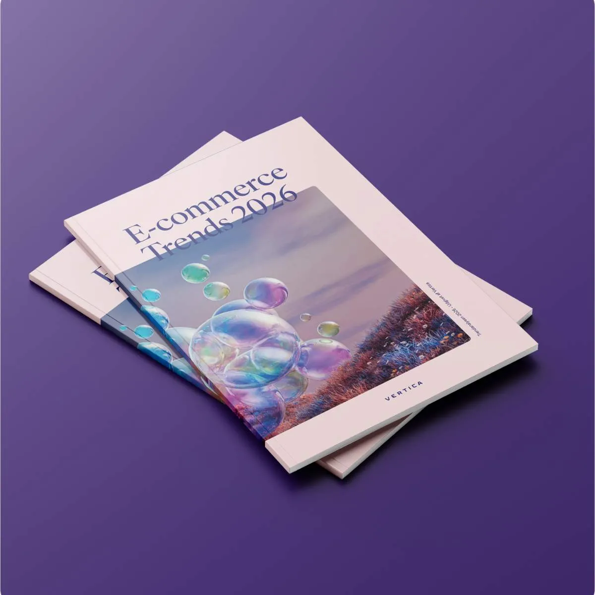 Tre brochurer med titlen "E-commerce Trends 2026" ligger på en lys overflade, prydet med farverige grafik og moderne design.