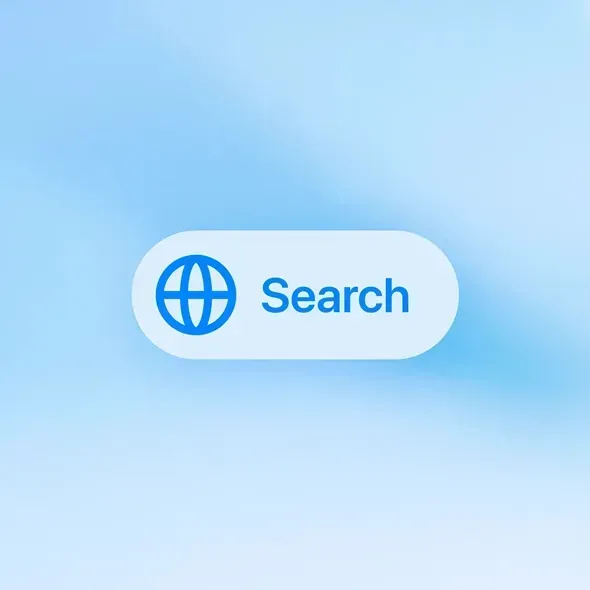 Søgeknap med globus-ikon og teksten "Search" på en lys blå baggrund.