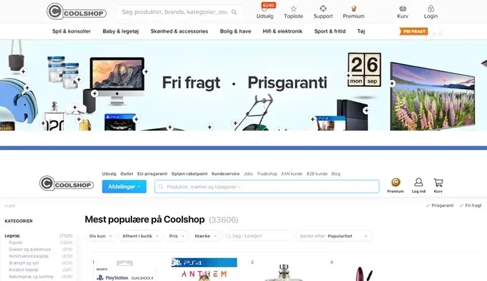 Skærmbillede af Coolshop hjemmeside med fokus på populære produkter, gratis fragt og prisgaranti, samt navigationsmenu og kategorier.