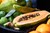 Flækket papayafrugt blandt andre frugter ved Hørkrams madmesse der også afholdes digitalt
